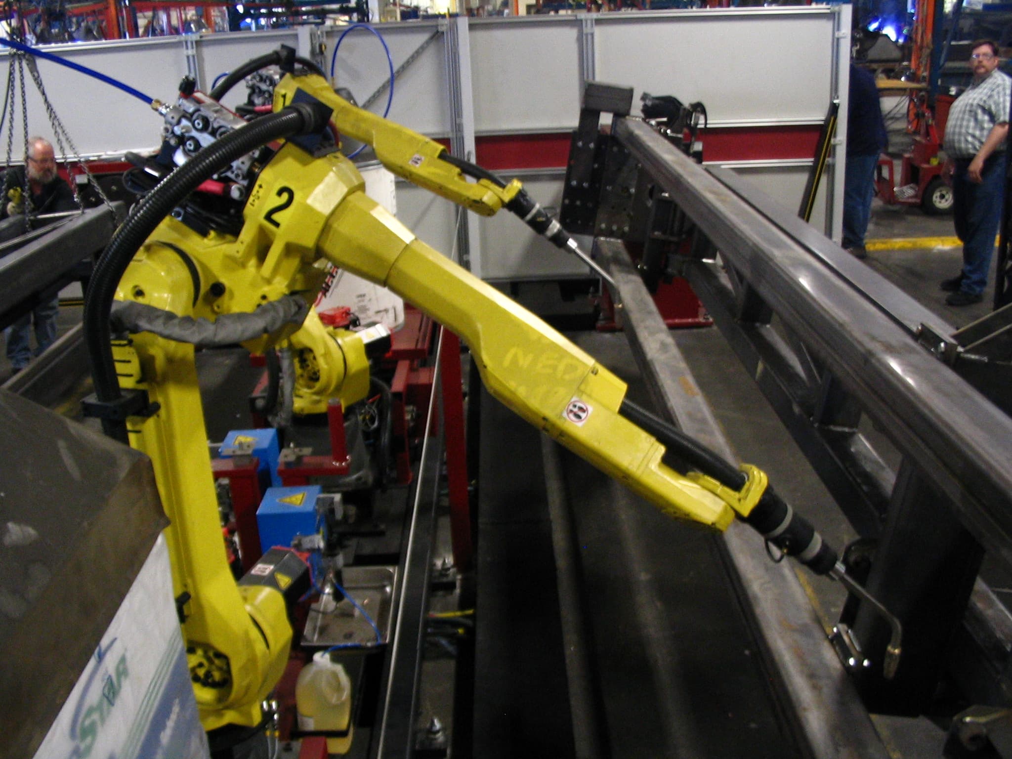 Industrial robots along an automotive production line